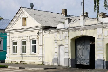 House with a gate in the province in Russia clipart