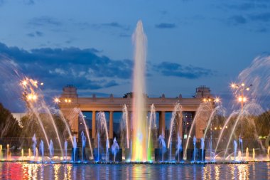 Colorful light fountain in Moscow Gorky park clipart