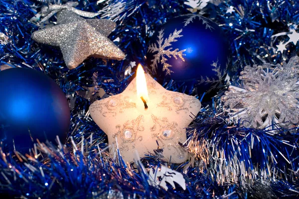 Christmas star candle and decorations Stock Picture