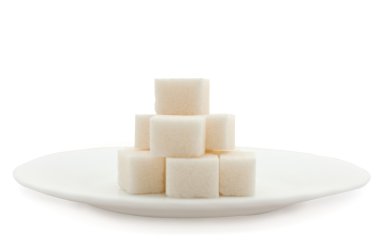 Sugar cubes on a plate clipart