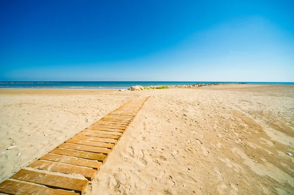 Mar azul e areia — Fotografia de Stock