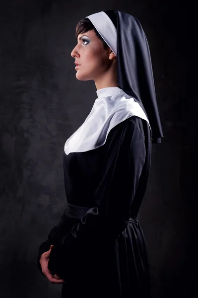 Young attractive nun indoors — Stock Photo, Image