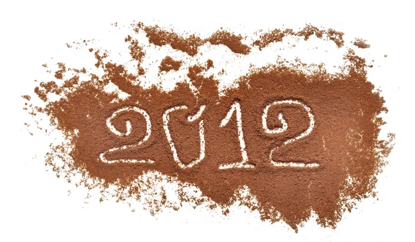 Numer 2012 napisane na tle kawa młyn — Zdjęcie stockowe