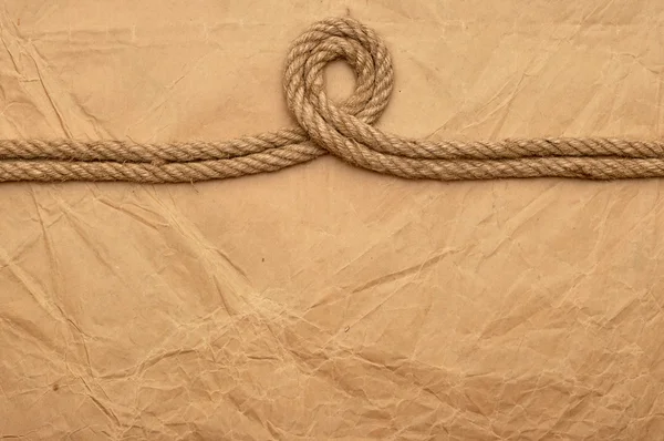 Rope on old paper — Stock Photo, Image