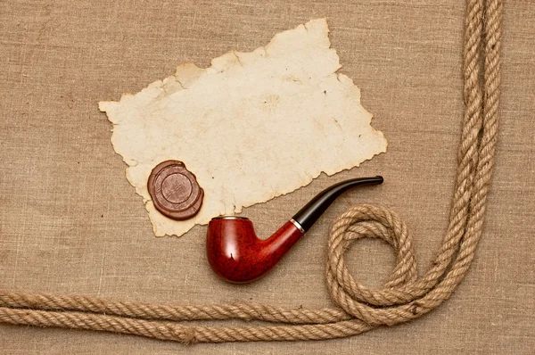 Труба и веревка из старой бумаги — стоковое фото