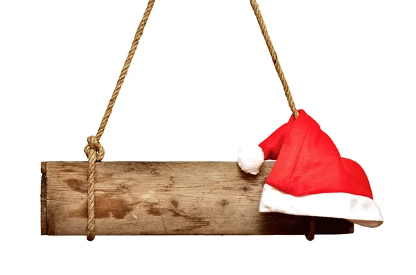 Placa velha com chapéu de Papai Noel isolado em um fundo branco — Fotografia de Stock