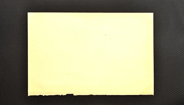 Folhas de papel velhas sobre fundo preto — Fotografia de Stock
