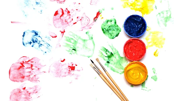 Paint brushes with opened paint buckets — Stock Photo, Image