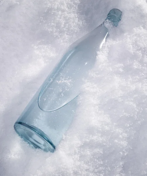 Bottle in the snow — Stock Photo, Image