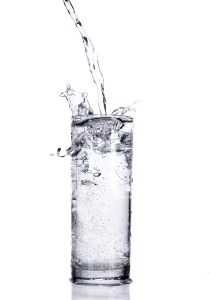 Puring water on white background — Stock Photo, Image