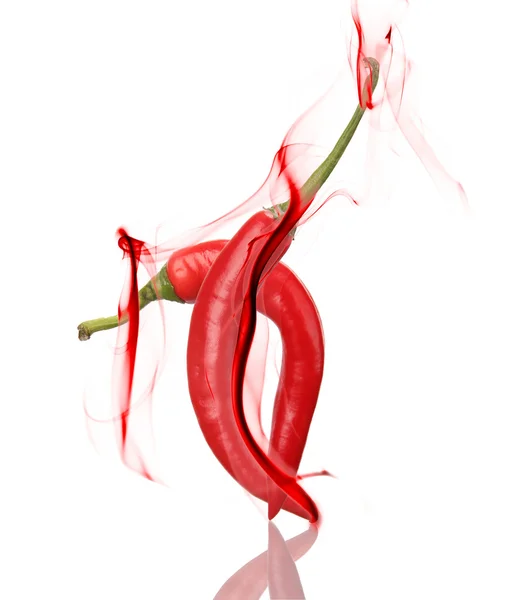 Chilly peppers with red smoke over white background — Stock Photo, Image