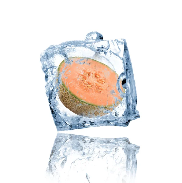 Melon frozen in ice cube — Stock Photo, Image