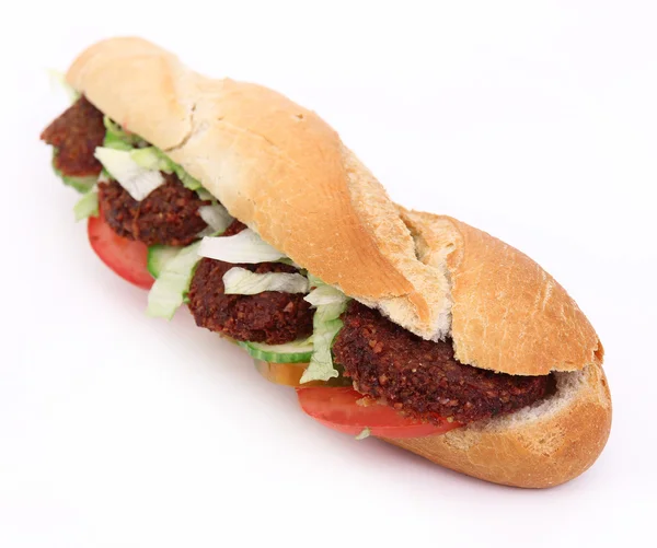 Tasty falafel baguette — Stock Photo, Image