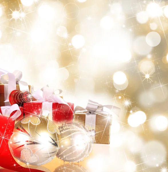 Weihnachten Hintergrund mit verwischten goldenen Lichtern — Stockfoto