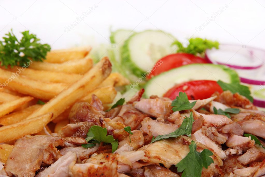 Gyros with french fries and vegetables
