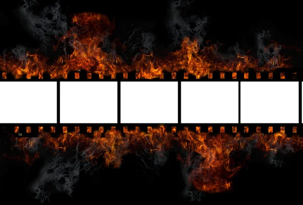 Spalanie stare klatki filmu — Zdjęcie stockowe