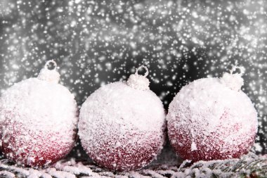 Christmas decorations covered with snow