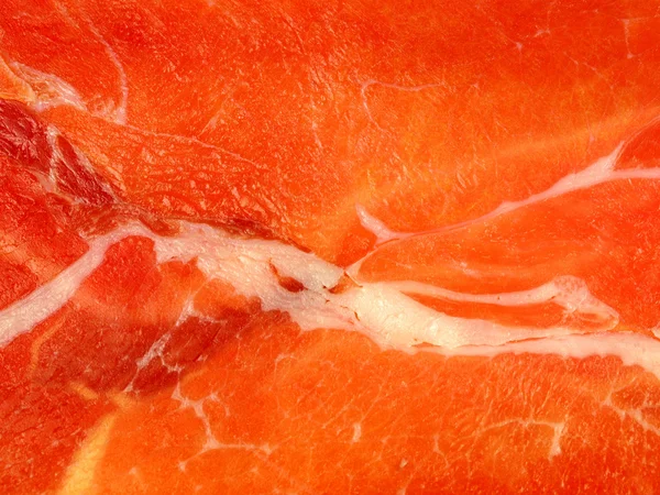 A slice of jamon background — Stock Photo, Image