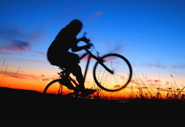 Evening biker silhuette — Stock Photo, Image