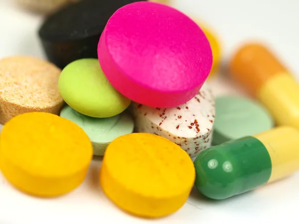 Close-up pillole mediche e compresse sfondo — Foto Stock