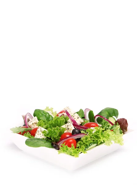 Greek salad over white — Stock Photo, Image