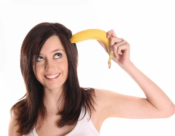 Красивая женщина с бананом — стоковое фото