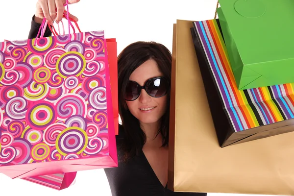 Hermosa mujer con un montón de bolsas de compras — Foto de Stock