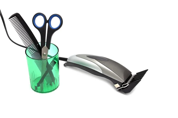 Клиппер для волос, расческа и ножницы — стоковое фото