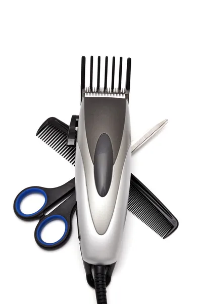 Затискач для волосся, гребінець і ножиці — стокове фото