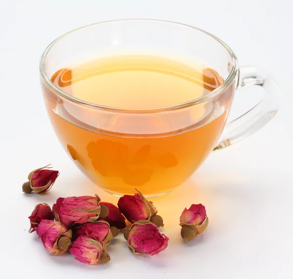 Xícara de chá e rosas de chá . — Fotografia de Stock