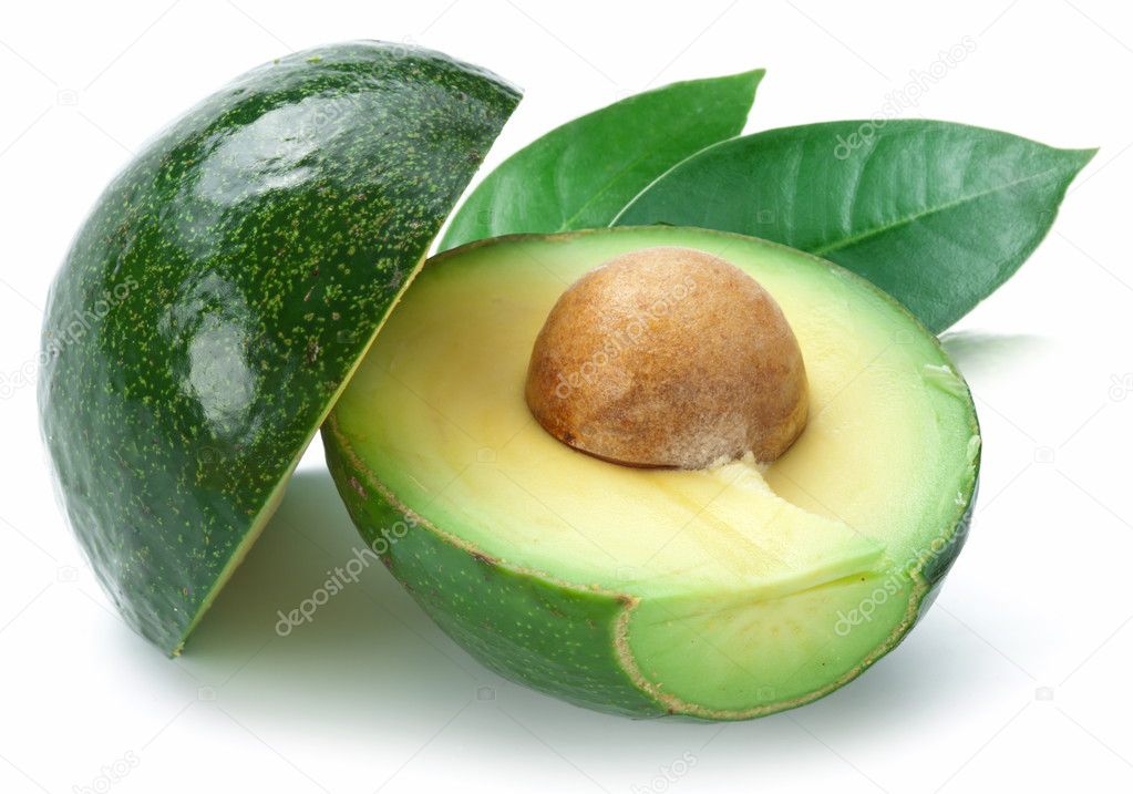 Ripe avacados with leaves.