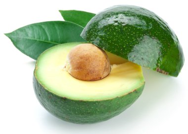 Ripe avacados with leaves. clipart