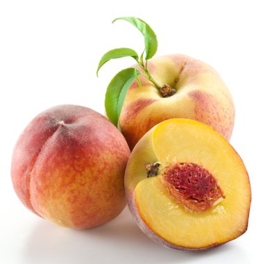 Ripe peach fruit with leaves and slises clipart