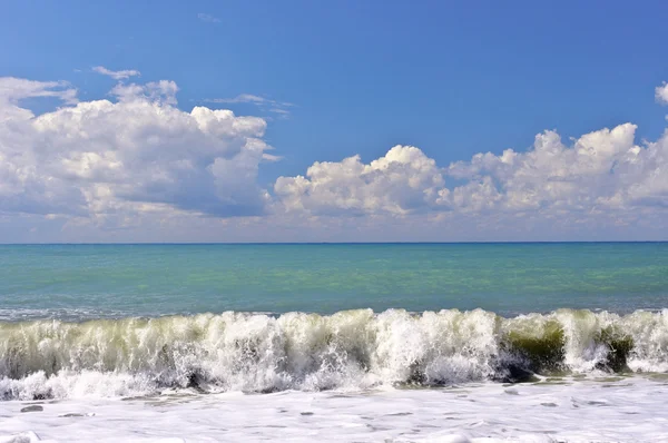 stock image Big waves of surf on the sea coastline in summer