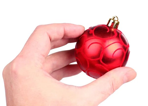 Рождественская игрушка в руке — стоковое фото