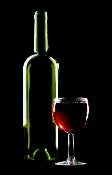 Bottles and glass beaker — Stock Photo, Image