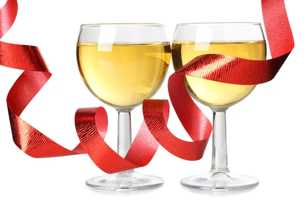 Wine in glasses and ribbons — Stock Photo, Image