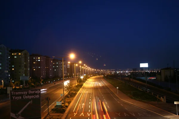 Autó fények éjszaka autópályán elmosódott mozgás — Stock Fotó