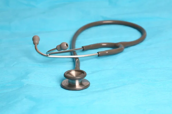 Lekarz stetoskop i wykres serca pacjenta — Zdjęcie stockowe