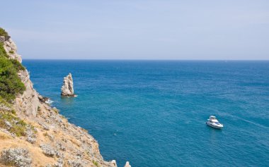 Marine bay with rocks and cutter clipart