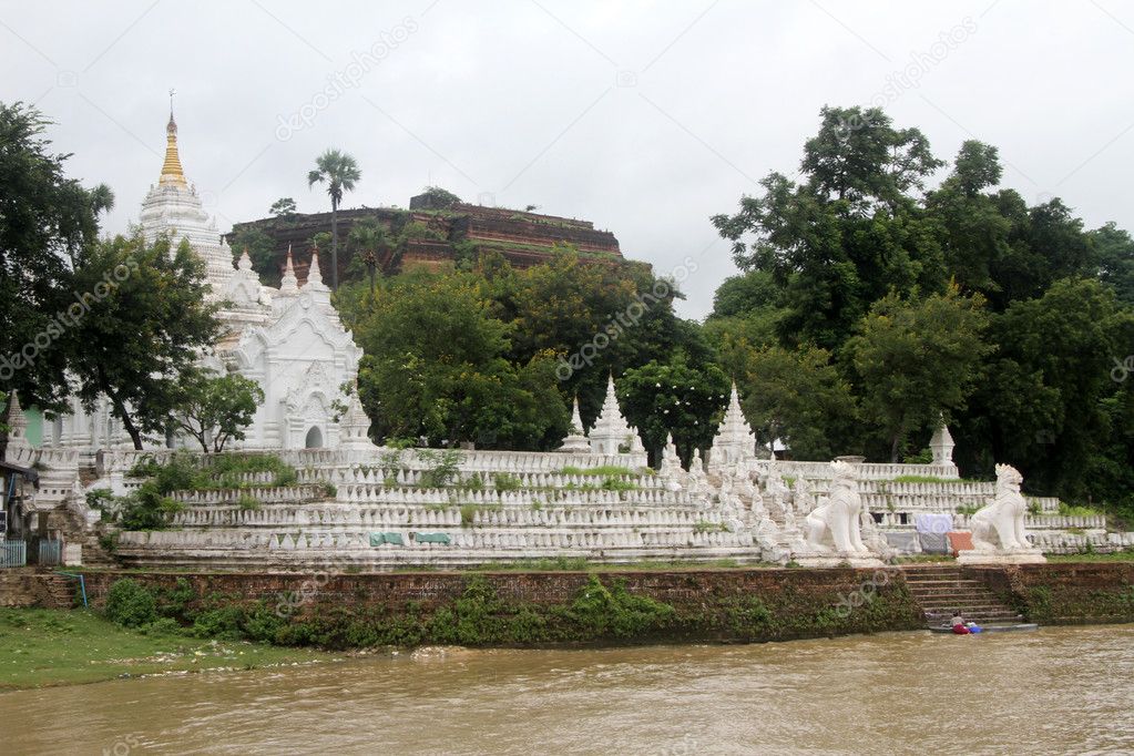 White temple and brick stupa
