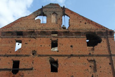 Facade of red brick mill