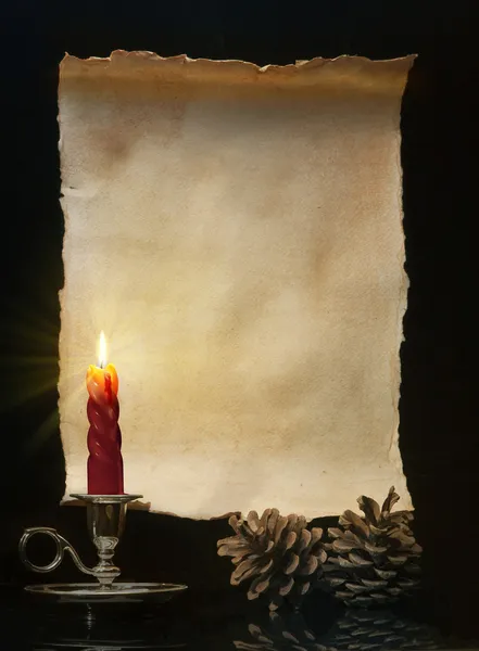 Vintage roll lit a candle — Stock Photo, Image