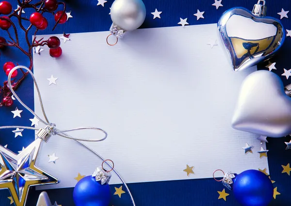 Umění vánoční pozdrav na modrém pozadí — Stock fotografie