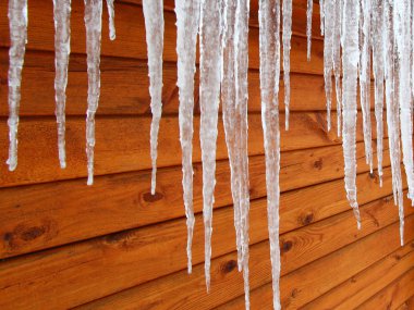 Icicles on a Cabin clipart