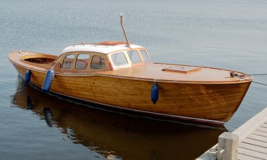 Retro wooden motorboat clipart