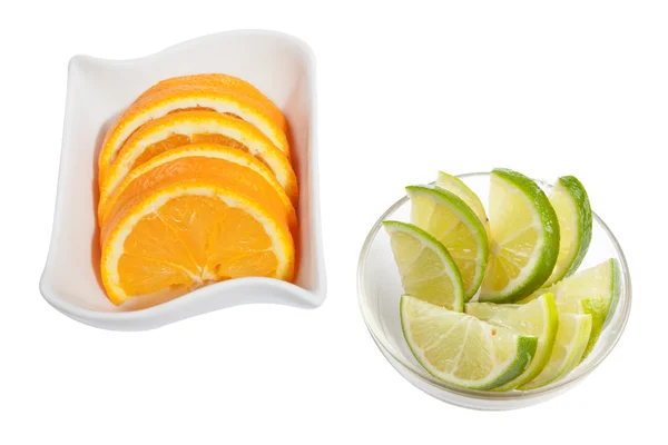 Pomeranče a limety — Stock fotografie