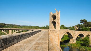 Medieval bridge in Besalu, Spain clipart