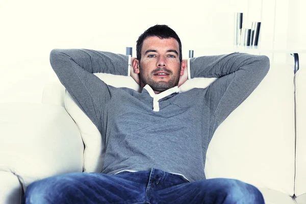 Relaxed man on his sofa — Stock Photo, Image