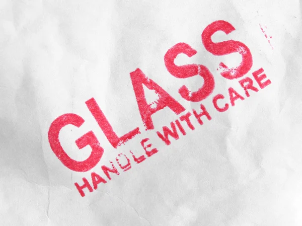 Glas handtag med omsorg — Stockfoto